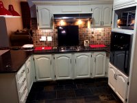 Installing of painted Cabinet doors & drawers.