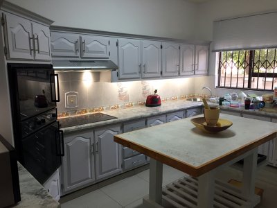 Makeover including new hinges, door handles, cornicing, cookerhood & under counter lighting